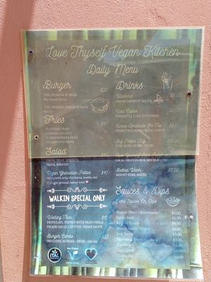 Daily menu on the outside of the building at Love Thyself Vegan Kitchen in St Georges