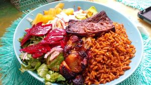 Tasted as good as it looks!!!😭❤❤ Jollof Rice, Suya Tofu, Ripe Plantain and Salad at Love Thyself Vegan Kitchen in St Georges