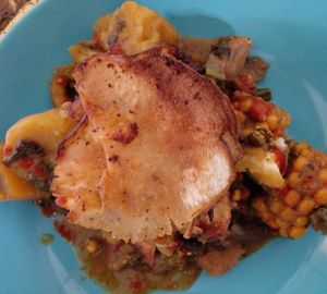 Vegan oil down with breadfruit chips at the top at Love Thyself Vegan Kitchen in St Georges