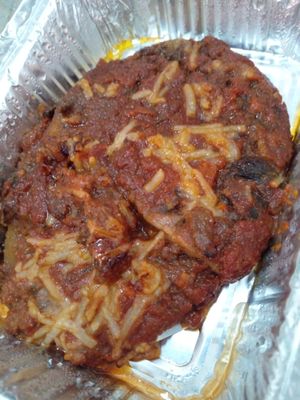 Eggplant parmesan (usually comes with salad and garlic bread) at Love Thyself Vegan Kitchen in St Georges