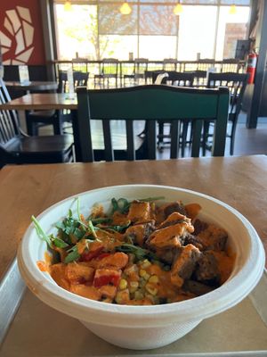 Veganized Grain Bowl. Sub chicken for vegan Beyond Sausage (+ $2). Corn, arugula, roasted peppers, avocado grain salad. Really enjoyed it. at Toma Mojo Grill in Richfield