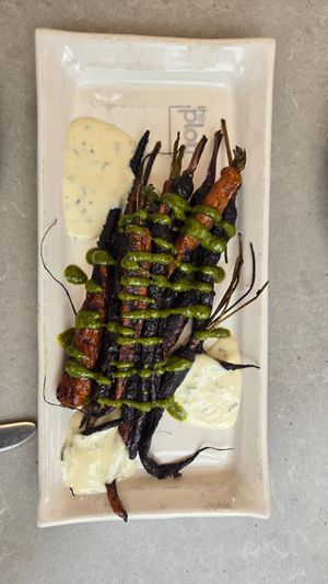 Carrots with a delicious pesto made from the carrot tops at The Plot in Costa Mesa