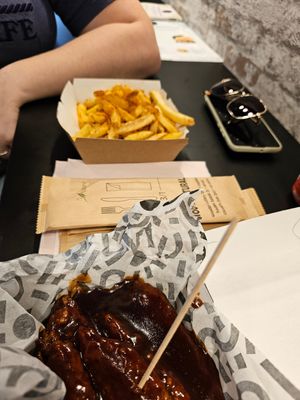Cajun Spiced Crispy Fries and BBQ Hot Wings at SAM'S KITCHEN in 