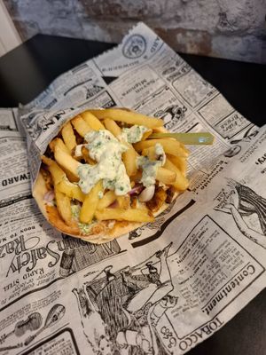 Wrap with fries inside at SAM'S KITCHEN in 