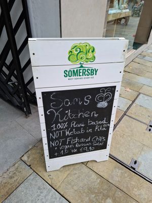 Outside in the shopping street at SAM'S KITCHEN in 