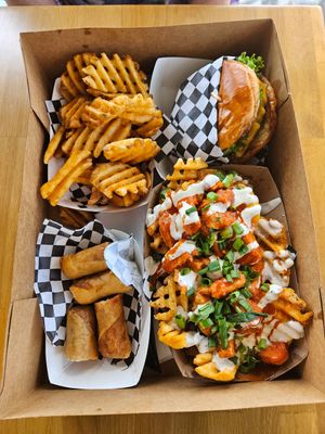 Waffle fries, single burger, egg rolls and Buffalo chicken at Planet Vegan in Fresno