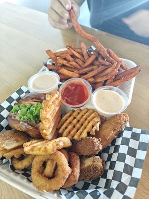 Try out platter with sweet potato fries and three vegan sauces. at Planet Vegan in Fresno