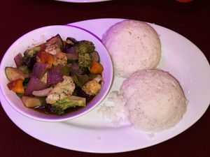 Belezian jerk veggies with double rice   at Enjoy Lounge & Restaurant in Caye Caulker