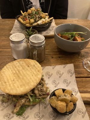 Oyster mushroom loaded fries (background) Oyster mushroom Arepas (foreground) and sweet potato yams to the side   at Chamo Street Food in Preston