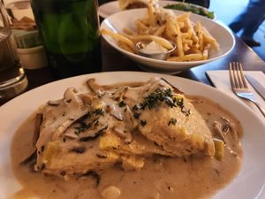 Vegan biscuit with mushroom gravy and just egg, truffle potatoes with vegan parmesan at POST  in New York City