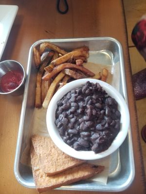 Kids menu "I just want to go home" tofu with 2 sides black beans and fries at The Smokin' Onion in Asheville