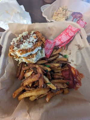 Sorry I started eating before taking a photo 😂 this was a chick'n biscuit and fries at The Smokin' Onion in Asheville