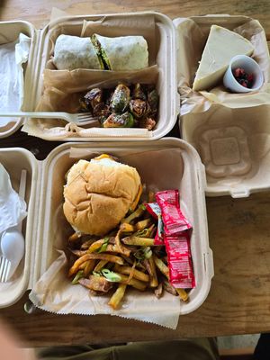 (Top) Johnny Utah + brussels sprouts, 
(bottom) Trashy Burger + fries, 
(side) cheesecake at The Smokin' Onion in Asheville