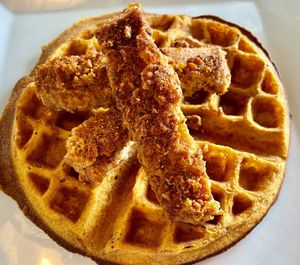 Chik’n and waffles. I expected a large piece of vegan chicken, not strips. Overly salty. I removed the breading    at The Smokin' Onion in Asheville