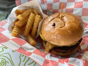 Hola Amigo Burger with Friesd  at Mike's Vegan Grill in Charlotte