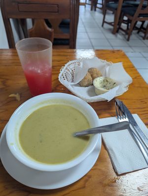 Soup, bun and juice at NATURALEZA Restaurante Vegetariano in Tampico