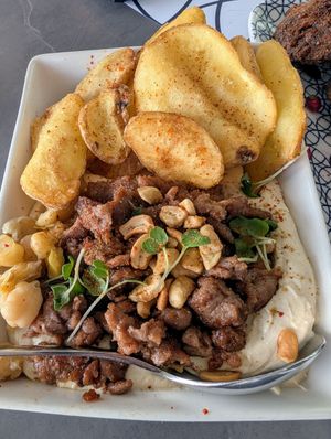 Hummus with Switch mock meat and fries at Al Safadi in Abu Dhabi