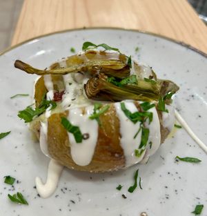 Jacket potato with seasonal vegetables at Baak Libreria Bistrot in Bologna