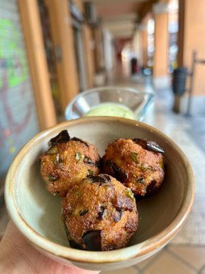 Aubergine and feta kafte with basil mayonnaise at Baak Libreria Bistrot in Bologna