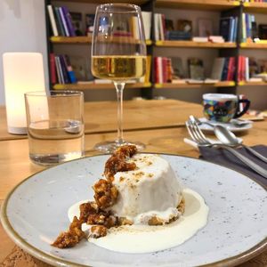 Vegan Vanilla Cheesecake, Ginger Sauce and Salted Caramel Granola at Baak Libreria Bistrot in Bologna