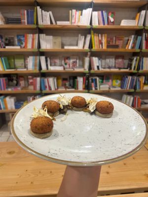 Kafte Sheep Ricotta and Zucchini Served with Babaganoush, Lacto-Fermented Vegetables and Sprouts at Baak Libreria Bistrot in Bologna