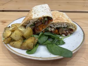 Oyster Mushroom Chili Burrito, Red Beans, Seasonal Vegetables, Basmati Rice at Baak Libreria Bistrot in Bologna