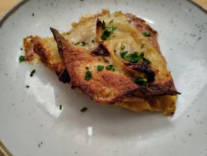 Lasagna with artichokes at Baak Libreria Bistrot in Bologna
