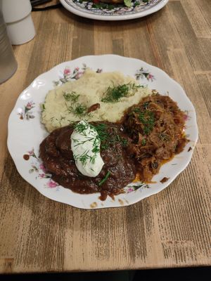 Cutlet with sauce, puree and fried cabbage at Vegan Friends Kitchen in Warsaw
