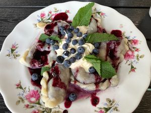 Blueberry dumplings with sour cream at Vegan Friends Kitchen in Warsaw