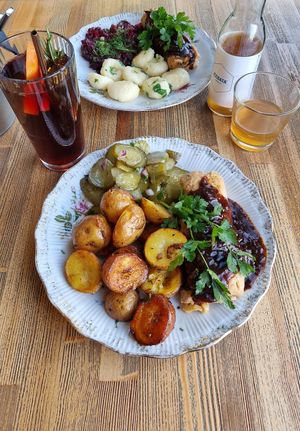 Vegan roulade with potatoes, dumplings, beetroot and cucumber salad at Vegan Friends Kitchen in Warsaw