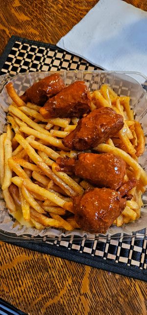 Vegan wings and cheese fries at That Weird Place in Amarillo