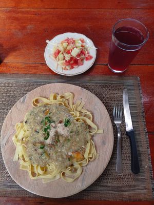 Pasta Alfredo, side salad, juice of the day at KAMIAVAN The Vegetarian Eatery in Corn Islands