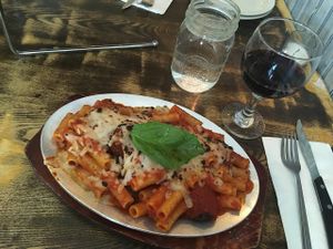 Meatball Parmigiana: gluten-free rigatoni with vegan meatballs, marinara sauce and topped with vegan mozzarella at Tufino Pizzeria in Astoria