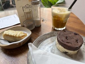 Ice cream sandwich (popcorn and miso swirls - honestly the main driver was a chocolate taste), white choc lemon bar, mango soy latte  at Das Lazy in Vienna