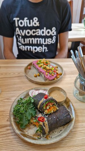 Sushi role and pink hummus sandwich at Daržo Dubuo in Vilnius