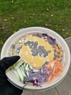 Seasonal pumpkin hummus bowl for take away at Daržo Dubuo in Vilnius