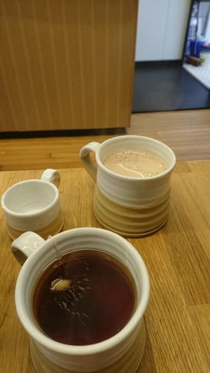 Hot chocolate with oat milk and cup of tea at Five Acres in St Andrews