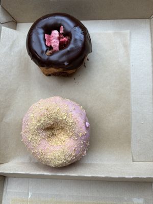 The top one is vegan chocolate covered strawberry and the bottom one is vegan cherry pie!  at Rose's Little Donuts in West Chester