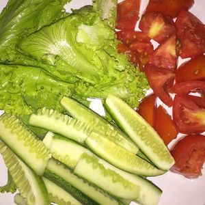 Just one of the many servings of these lovely raw veggies (crunchy cucumber, tasty tomato, and crisp lettuce) I had at the vegan dinner buffet. (Photo from my instagram http://www.instagram.com/p/BBc1xFrwDaZ) at Green Leaf Cafe in Koh Phangan