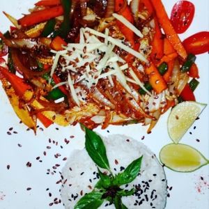 Fried vegetables in teriyaki sauce with fresh ginger, chia and flax seeds at Bamboo Bar & Vegetarian Restaurant in Sihanoukville