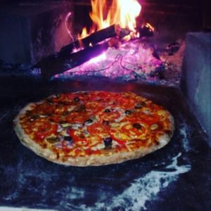 Pizza from wood fired oven in Bamboo Bar. Every day from 6 pm till 3 am. Vegetarian and vegan pizza at Bamboo Bar & Vegetarian Restaurant in Sihanoukville