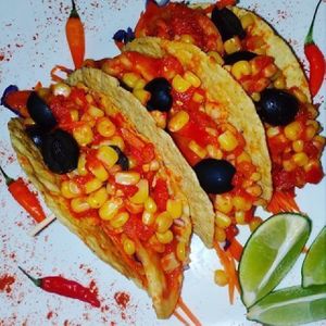 Vegan tacos in Bamboo Bar. With corn, tomatoes, red cabbage, carrots and olives. at Bamboo Bar & Vegetarian Restaurant in Sihanoukville