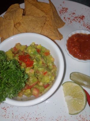 Avocado guacamole with nachos and salsa sauce at Bamboo Bar & Vegetarian Restaurant in Sihanoukville