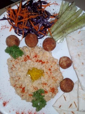 Hummus and falafel with homemade bread and veggies at Bamboo Bar & Vegetarian Restaurant in Sihanoukville