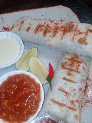 Spicy bean burrito with kidney beans and salsa sauce at Bamboo Bar & Vegetarian Restaurant in Sihanoukville