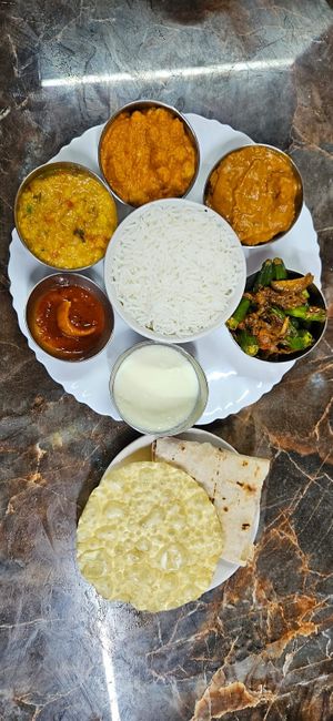 Want to try a few dishes try our Thali at Banana Leaf Restaurant Kovalam in Kovalam