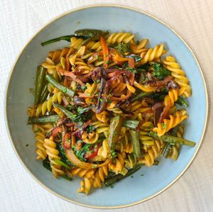 Spring pasta, delicious sauté vegetables on colorful pasta. at Saíra Café in Cascais