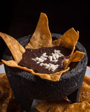 Frijoles refritos con Nachos at La Condesa  in Barcelona