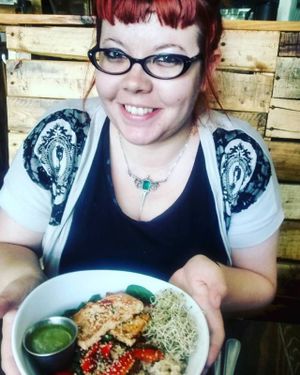 Me displaying my nourish bowl at Wild Leek in Halifax