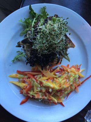 Blackened, marinated tofu served on rice, with a salsa of mango and red pepper. at Wild Leek in Halifax